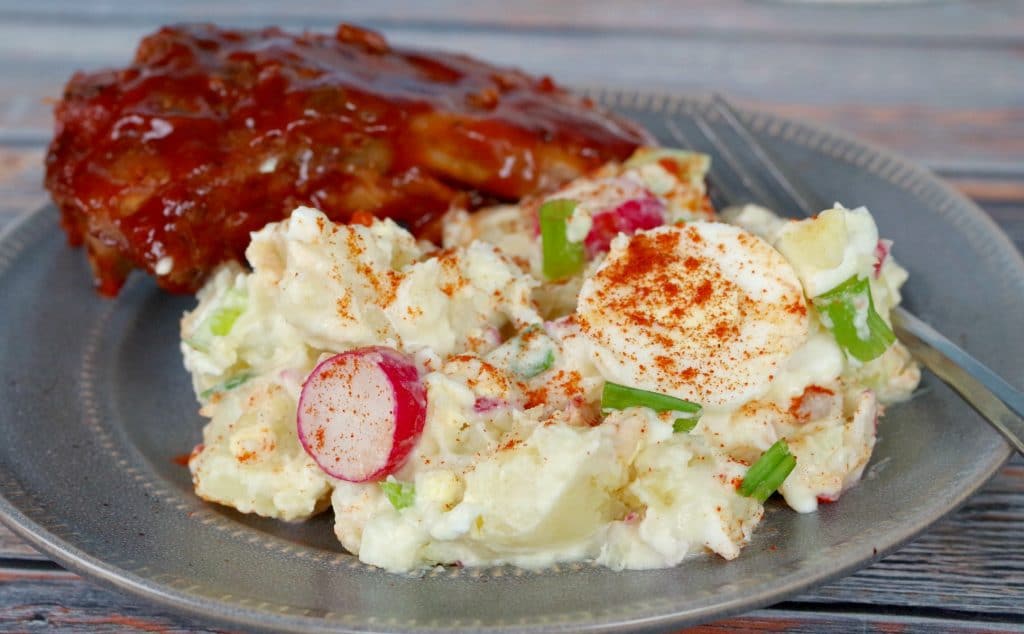 potato salad on plate with ribs