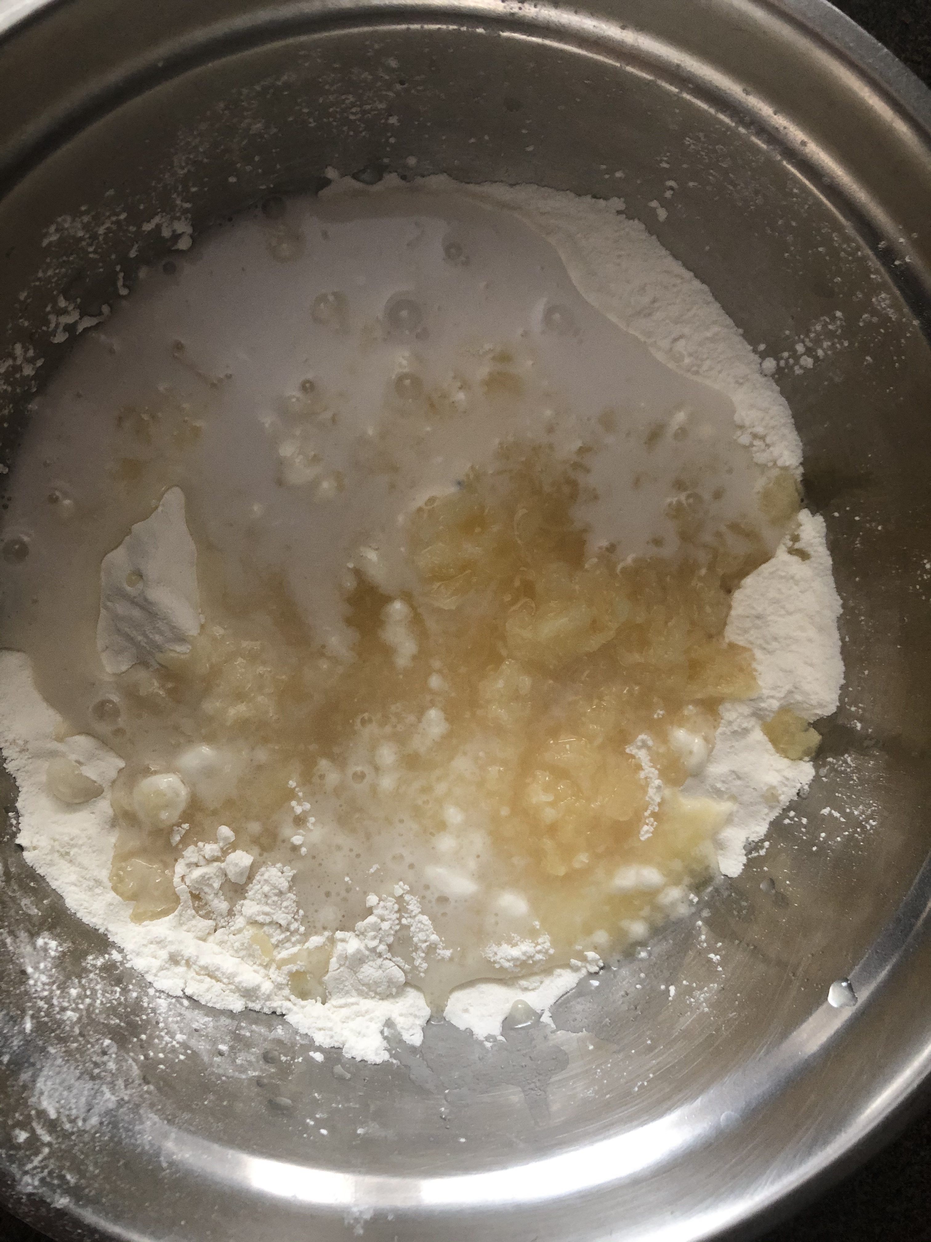 pineapple, angel food cake mix, coconut milk and extract mixed together