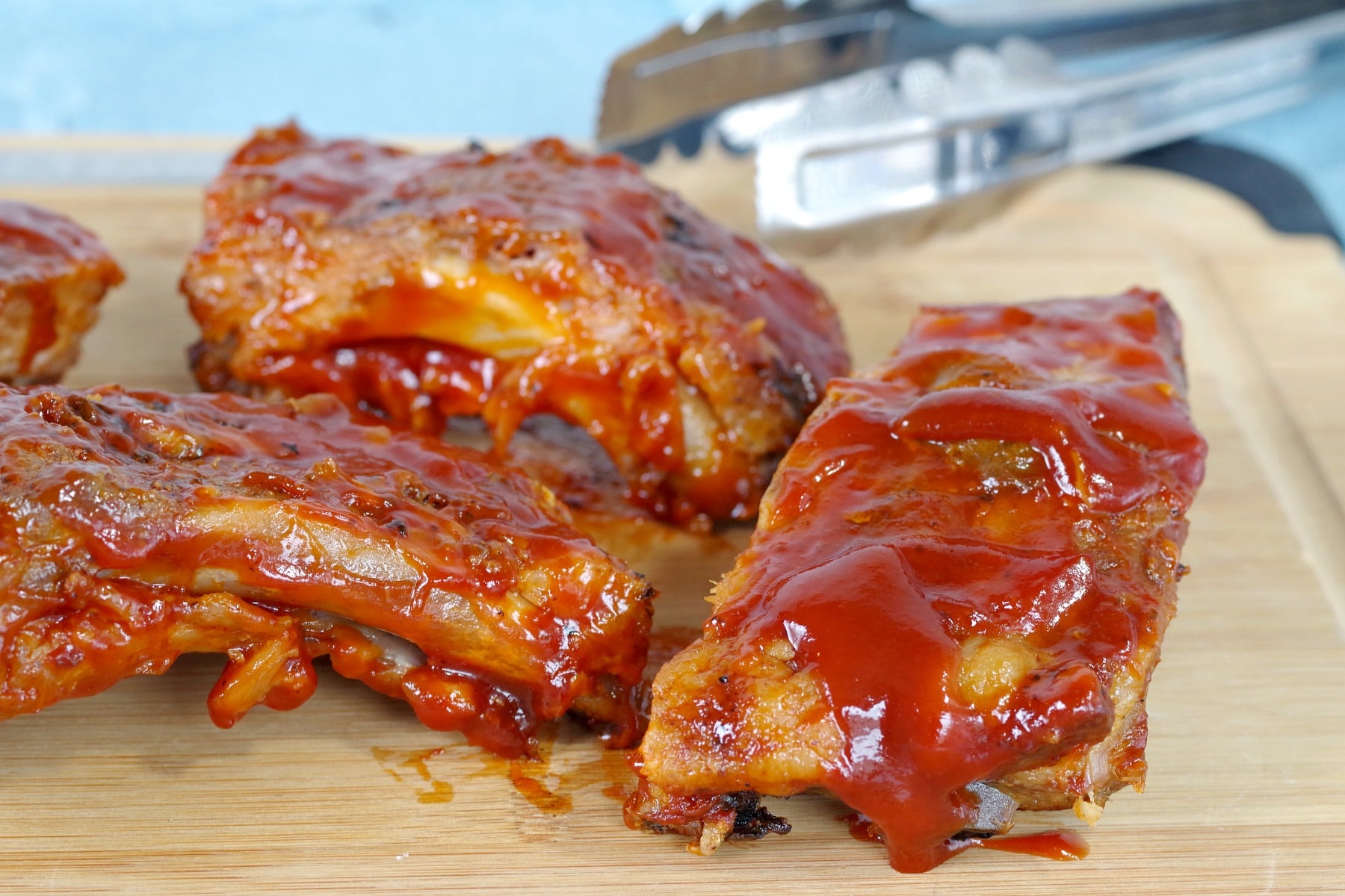 slow cooker BBQ beer ribs on a cutting board