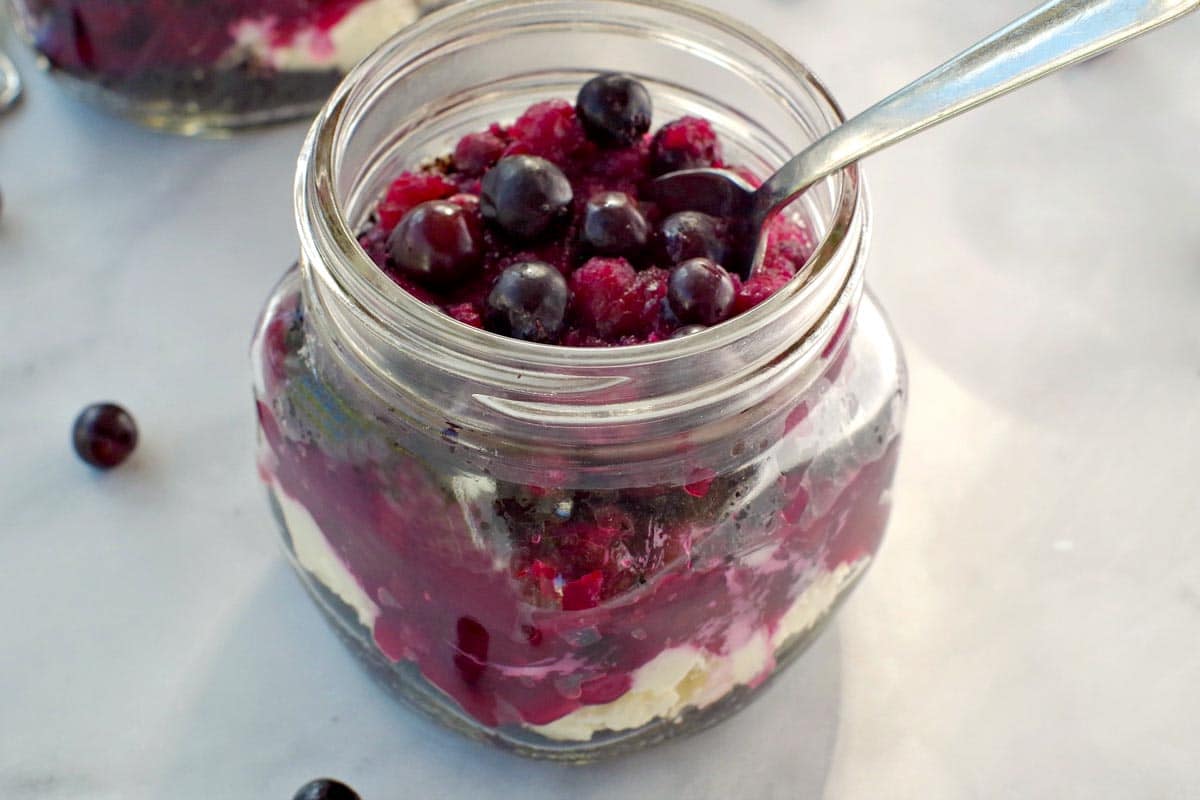 top view of No Bake Saskatoon berry cheesecake in a jar