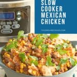 pin with text and photo of slow cooker mexican chicken in a blue dish with slow cooker in background