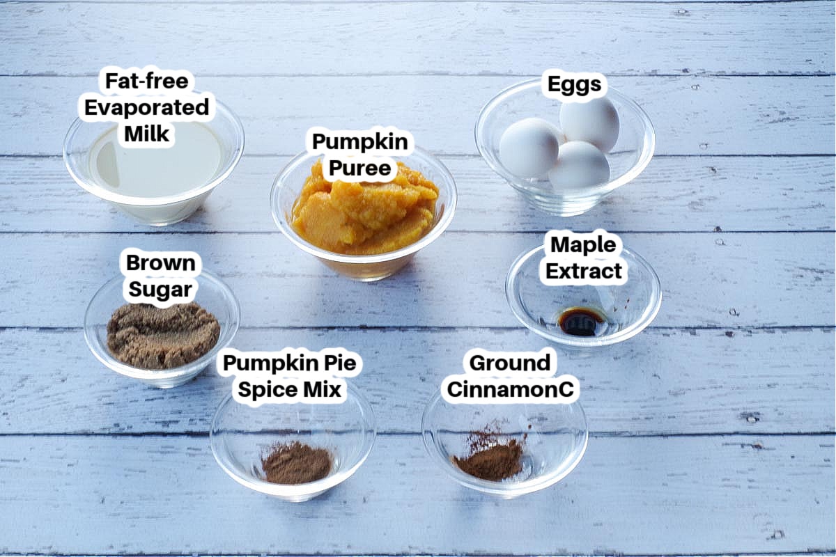 ingredients in crustless pumpkin pie in glass bowls, labelled