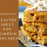 pin with text on the left and photo of stacked sheet pan pumpkin pie pancakes, with whipped cream on top and some eaten, fork on the side
