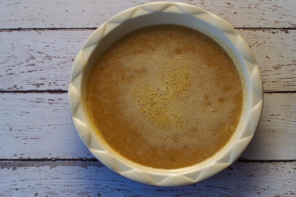 crustless pumpkin pie ingredients poured into pie plate