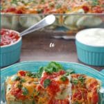 Pinterest pin with text at the top and bottom and photo of leftover turkey enchilada on a blue plate with glass dish of enchiladas in background and blue ramkins with sour cream and salsa right behind the dish