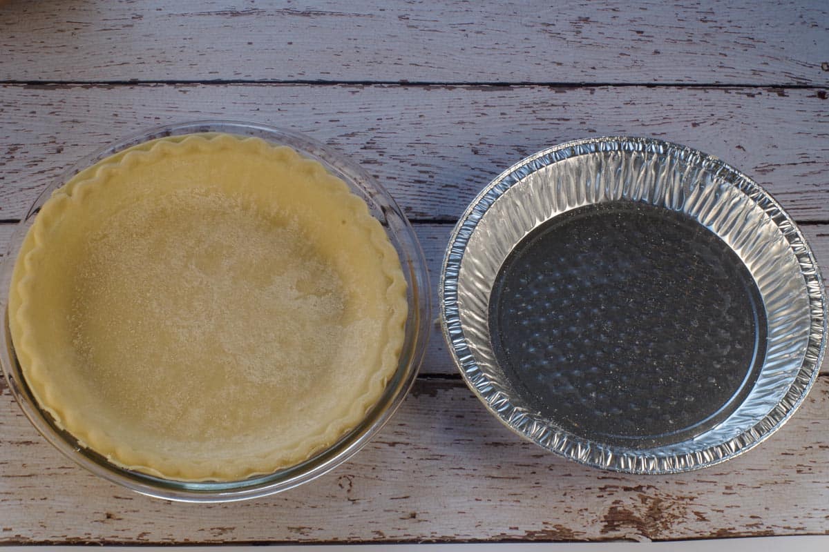 A frozen store-bought pie shell transferred from it's original aluminum pan to a glass pan.