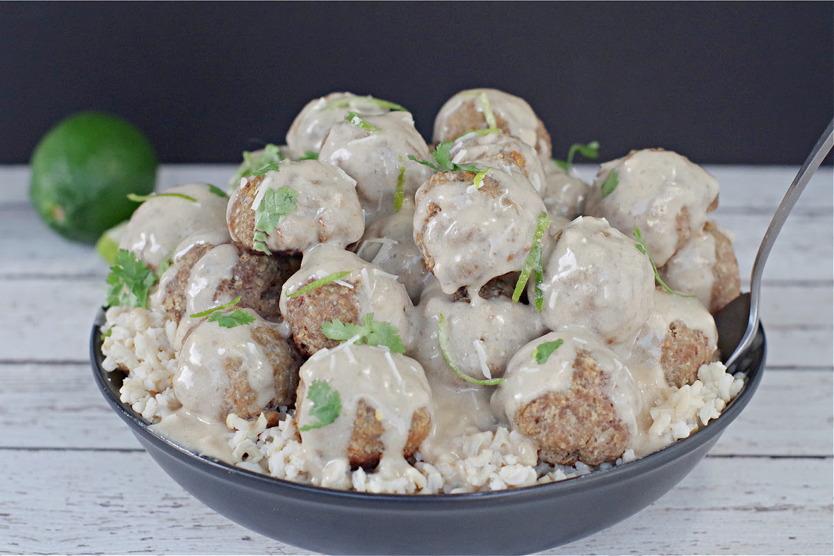 turkey meatballs with rice in black bowl