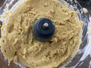 ingredients for hummus pureed in blender
