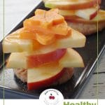 Pinterest pin with photo of healthy caramel apple pie bites on a black tray and dark text on white background at the bottom