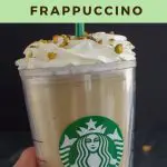 pinterest pin with brown text on light green background on top and bottom and photo of a starbucks pistachio frappuccino