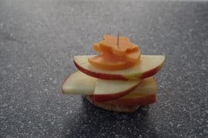 toothpick pushed through apple pie bite
