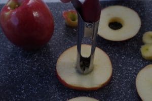 apple core being removed with end of apple corer