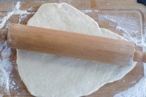dough rolled out on cutting board