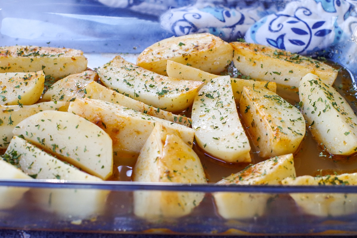 greek style potatoes in a glass dish