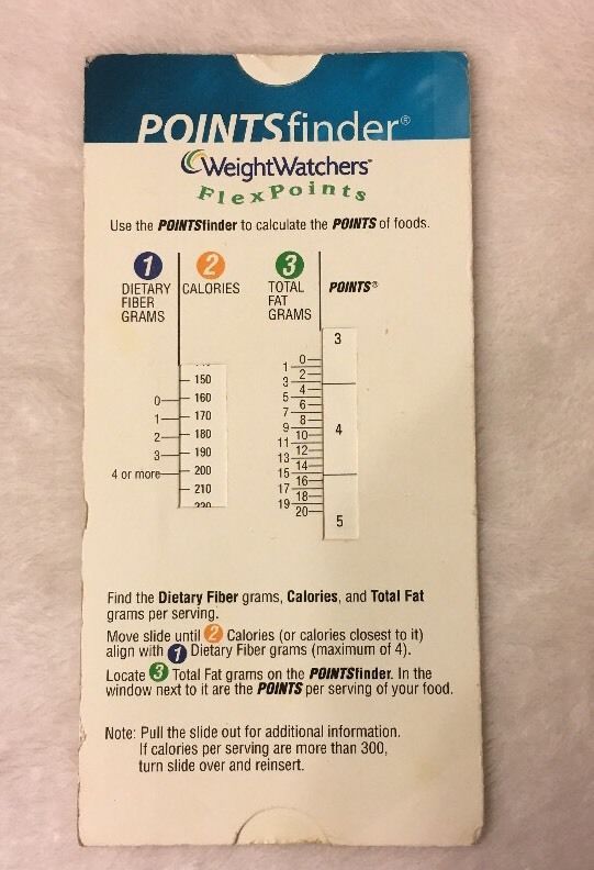 weight watchers slider on a beige surface