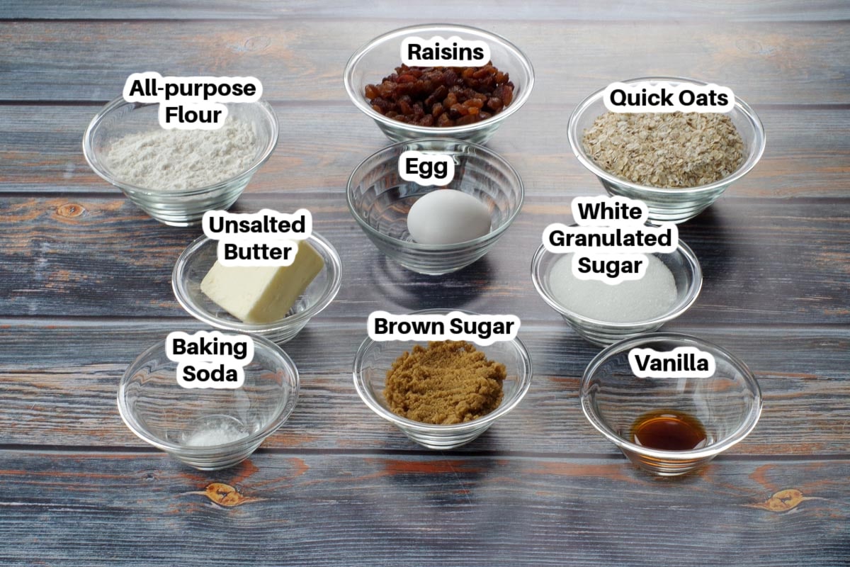 Ingredients in Oatmeal Raisin Cookies in glass bowls, labelled