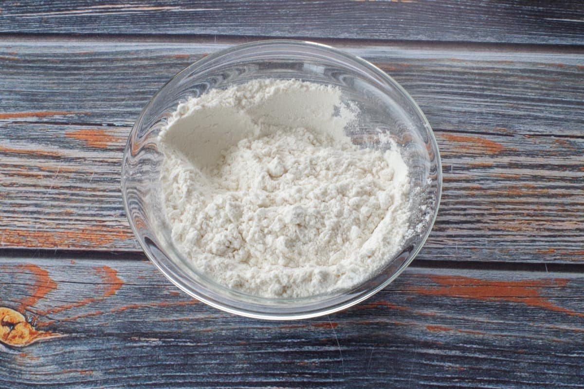 flour and baking powder in small glass bowl