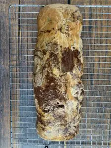 biscotti log cooling on cookie sheet