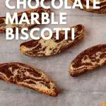 pinterest pin with white text and a photo of chocolate marble biscotti pieces on parchment paper