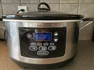 slow cooker on a brown counter top