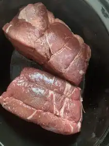 2 chuck roasts in a slow cooker
