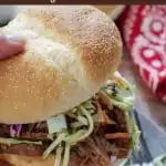 pinterest pin with white text on brown background on top and bottom and photo ofhand holding up beef on a bun over grey plate