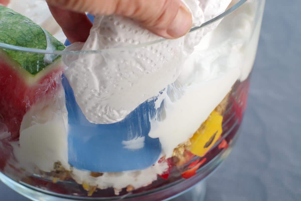 glass being wiped off with paper towel