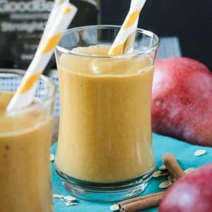 pumpkin pear smoothies on blue surface with pears in background