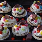 8 Leftover Halloween Candy Tarts on a black platter with candy