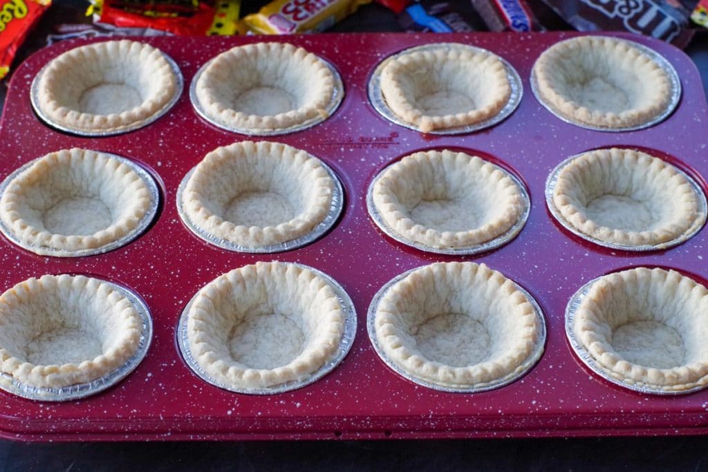 Blind baked tarts shells in muffin tin