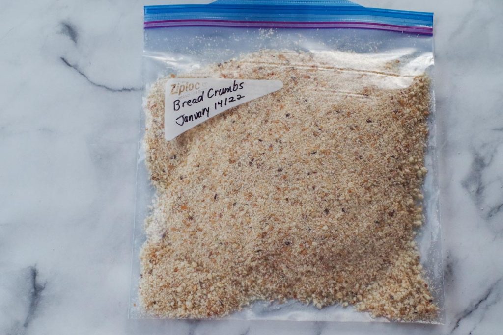 bread crumbs in a freezer bag, labelled, on a counter top
