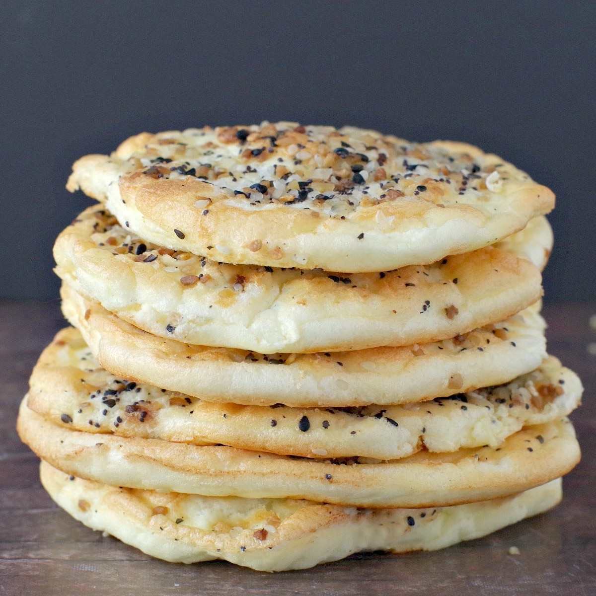 6 pieces of everything bagel cloud bread stacked on top of each other