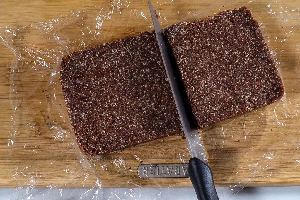 energy bars with a knife cutting through into bars