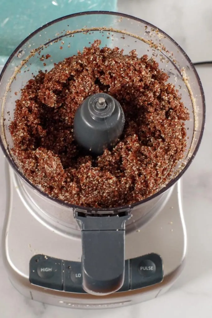 ingredients for energy bars ground together in food processor