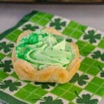 St. Patrick's Day dessert Shamrock Tart on a green shamrock patterned napkin