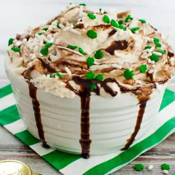 Baileys Irish Cream Dip in a white dish on white and green striped napkin