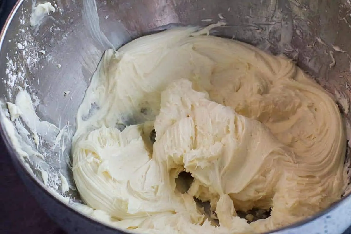 cream cheese frosting in mixing bowl