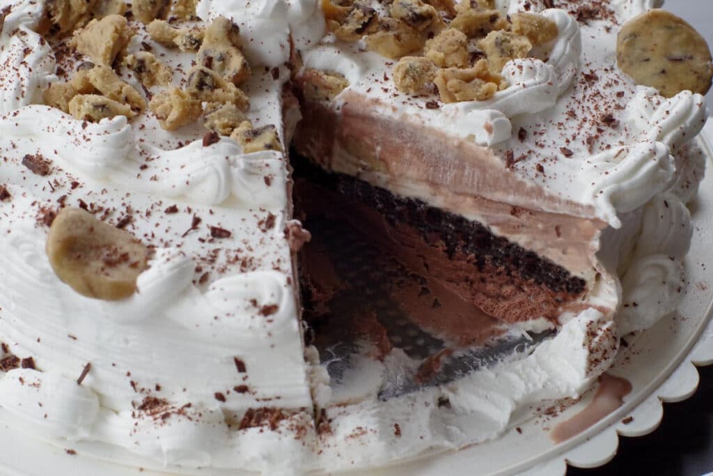 dairy queen cookie dough ice cream cake with a slice removed