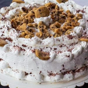 whole cookie dough ice cream cake on a white platter