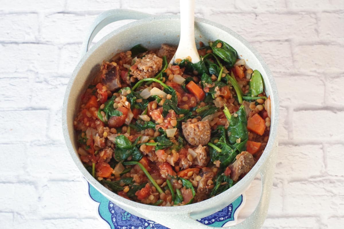 all sausage added to pot and heated until wilted