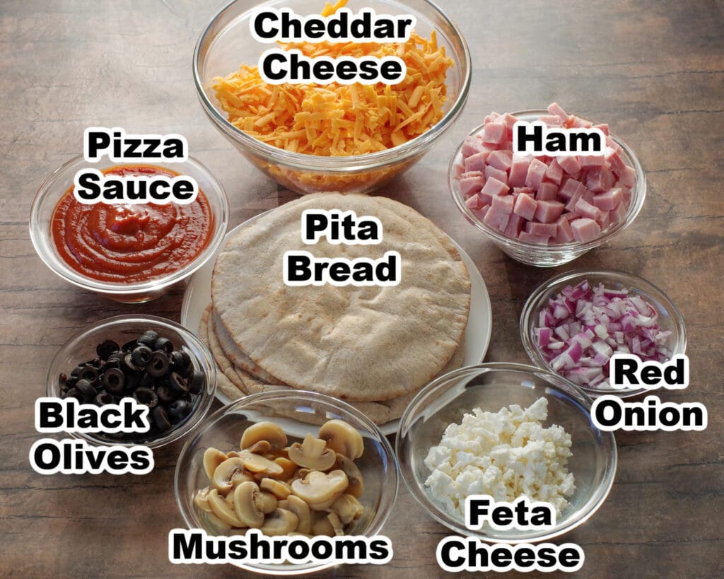 labelled ingredients for pita pizzas