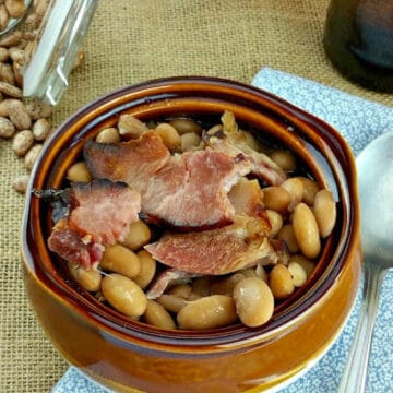 southern style ham and beans in a brown bowl