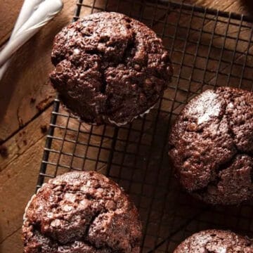 4 healthy chocolate bran muffins on a wire rack