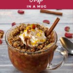pin with photo of rhubarb crisp in a glass mug and white text on red/pink background at top and bottom
