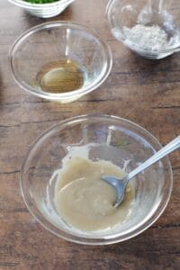roux (oil and flour) mixed together in glass bowl