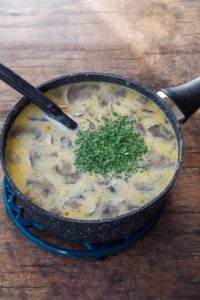 chives added to beer cheese soup broth