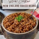 slow cooker baked beans in pottery with slow cooker in background