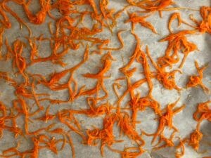 candied carrot on parchment sheet