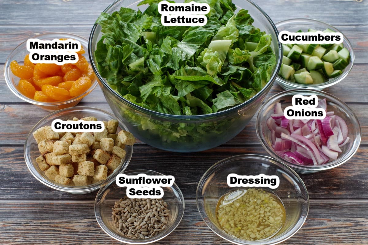 ingredients in mandarin orange salad in glass bowls, labelled