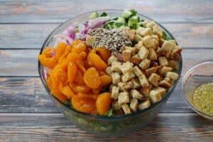 Mandarin orange salad ingredients in large bowl